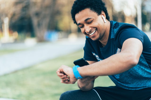 sportsman using smart devices