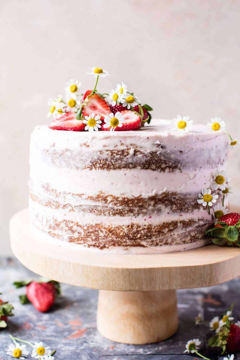 spring cake recipes strawberry coconut carrot cake on wood cake stand
