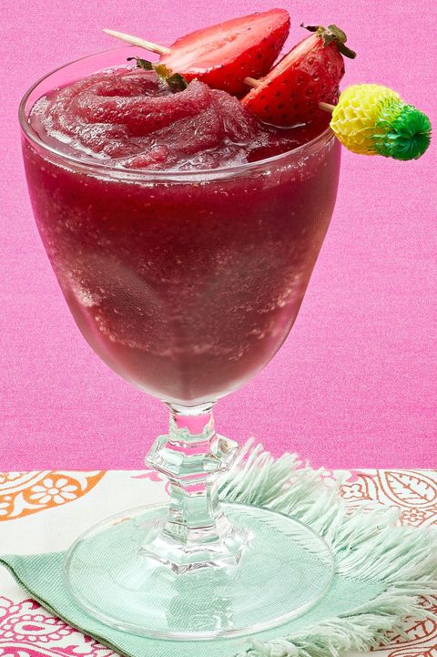 red berry frozen sangria with strawberries on toothpick
