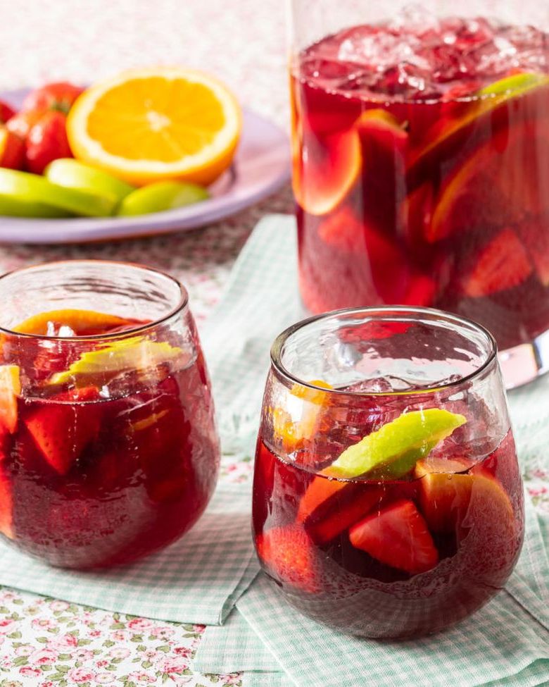 red sangria in pitcher and two glasses