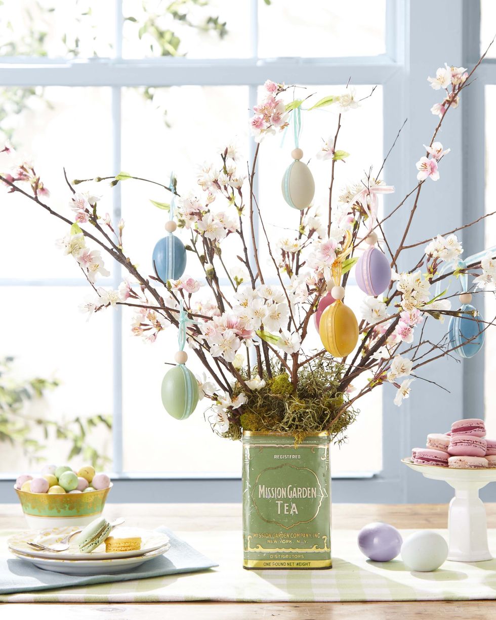 centerpiece tree made of floral branches and easter eggs