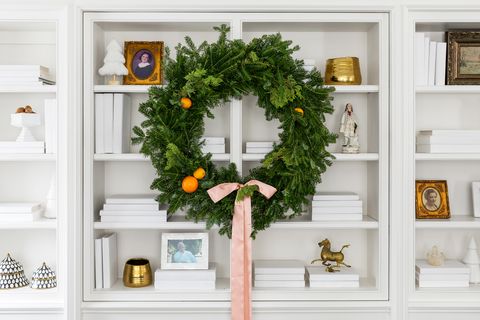 wreath on bookshelf