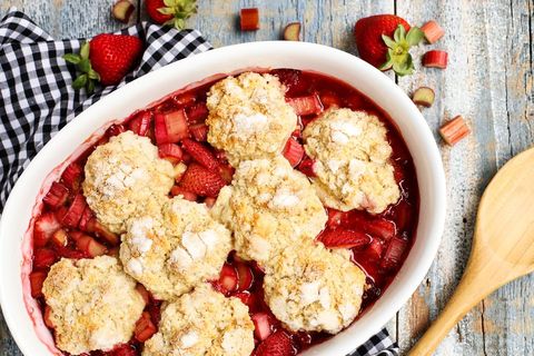 strawberry rhubarb cobbler in white baking dish