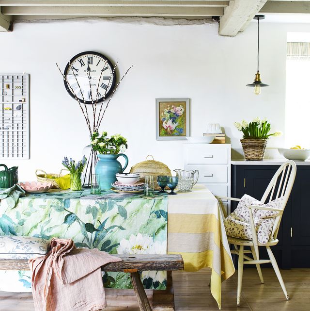 a dining room table featuring spring accessories