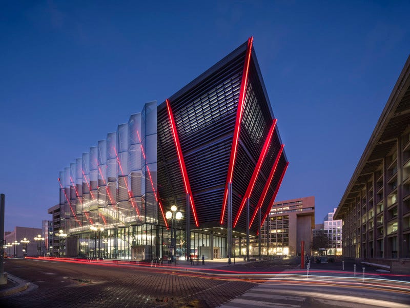 modern architectural structure with dynamic angles and red lighting