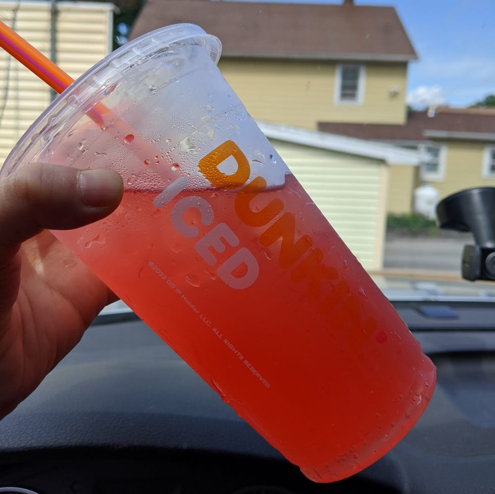 hacking the dunkin' pink spritz refresher plastic cup with iced pink drink