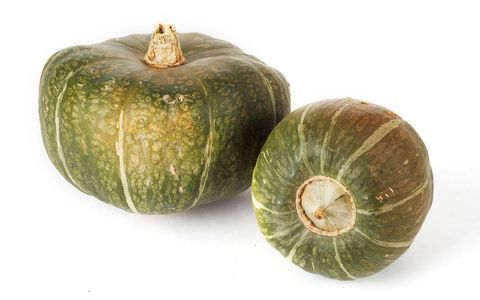 buttercup squash on a white surface from types of squash