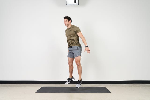 trainer ian finestein performing a series of squat exercises in may 2022