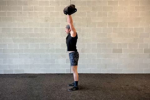 sandbag workout, squat to press