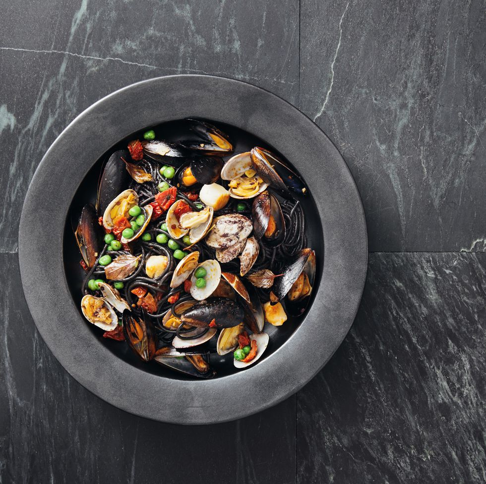 squid ink pasta with seafood and vegetables