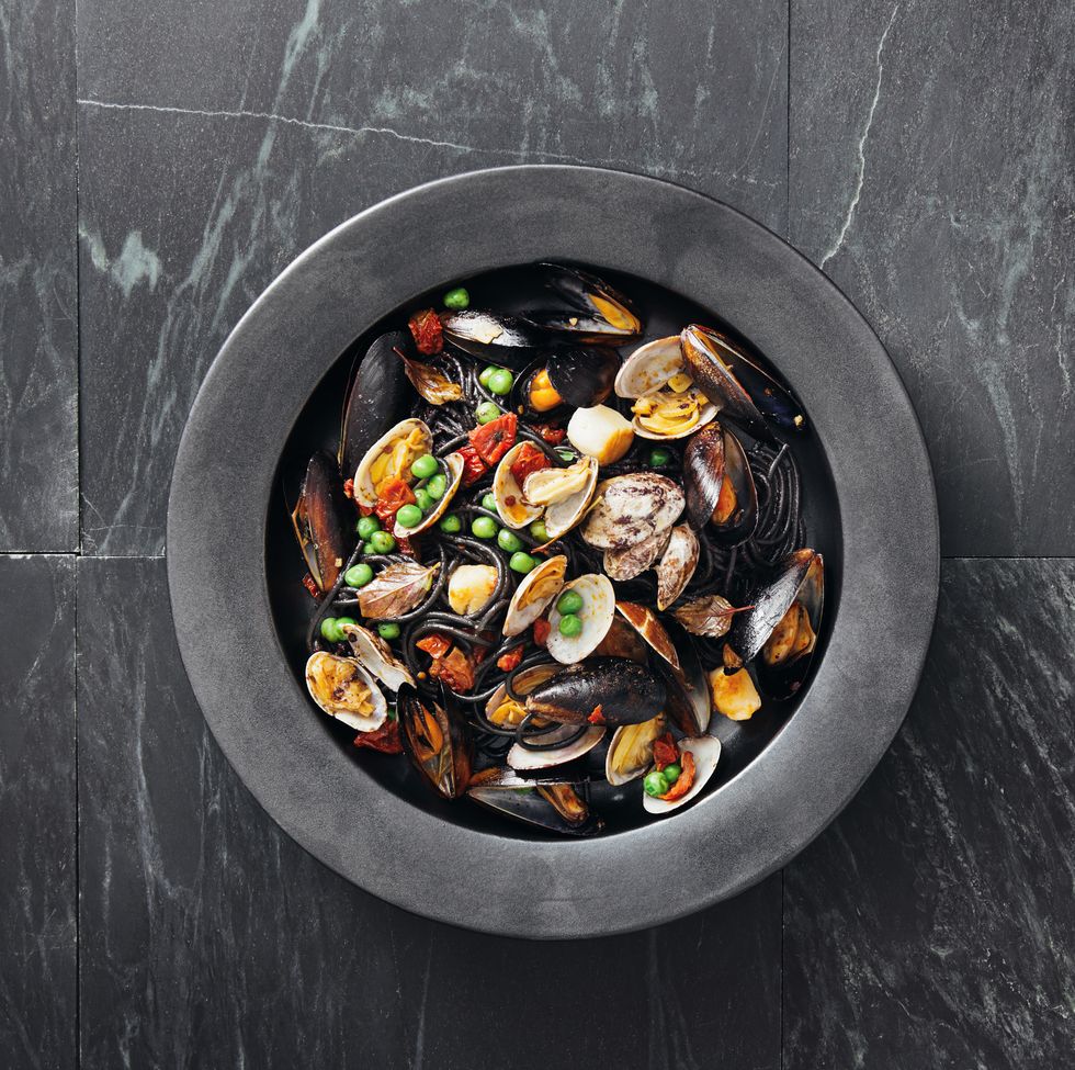 squid ink pasta with seafood and vegetables