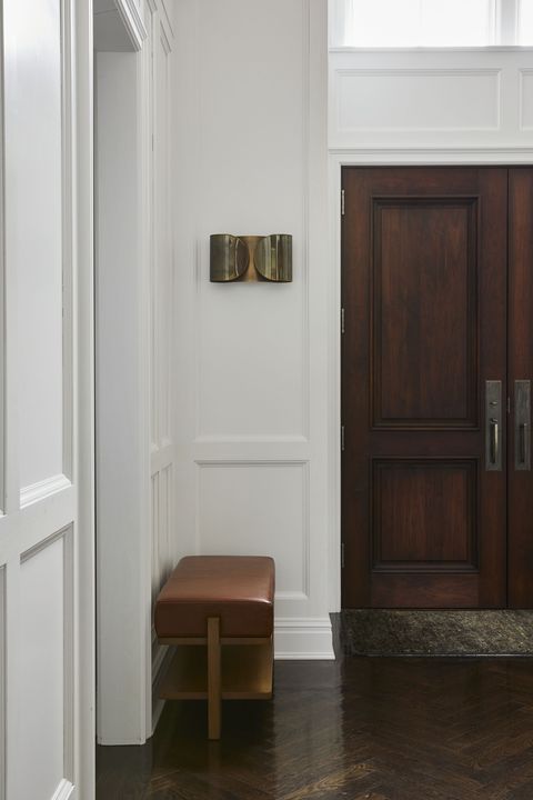 entry, brown front door, brown leather stool