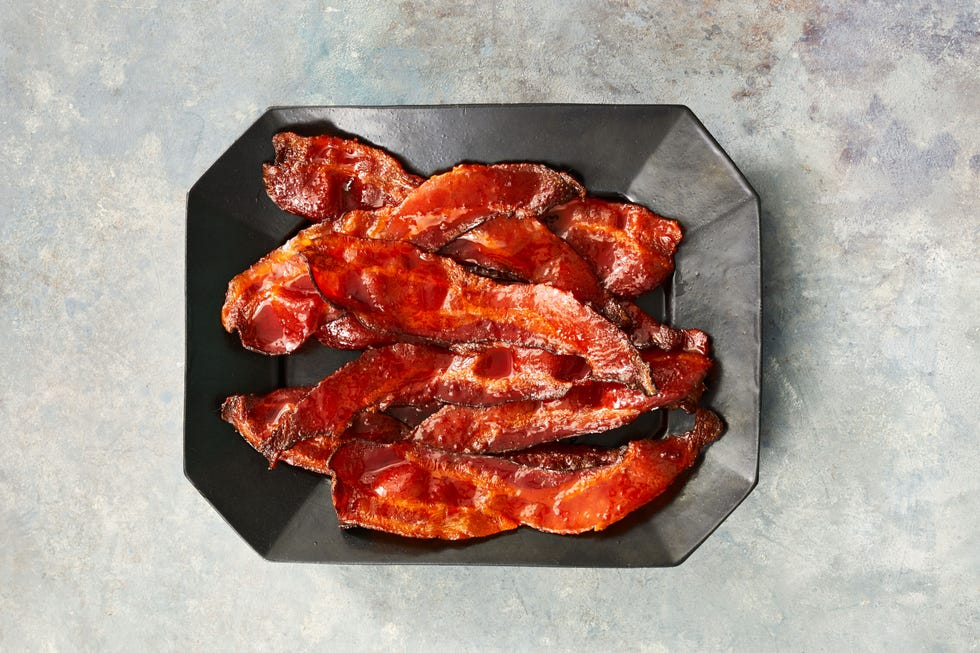 sriracha maple bacon on a dark gray platter