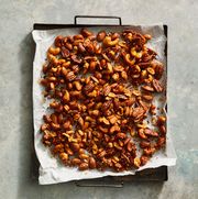 sriracha mixed nuts on parchment paper