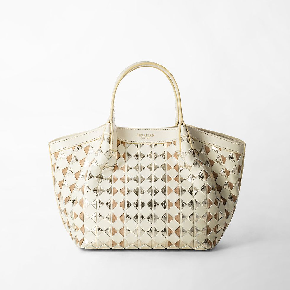 a tan and white purse
