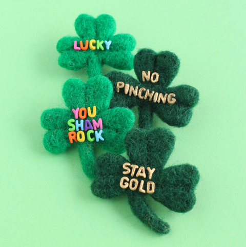 st patrick's day crafts diy shamrock pins with words on front