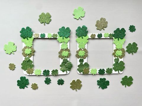 white square photo frames decorated with glittery shamrocks, an easy st patrick's day kids' craft