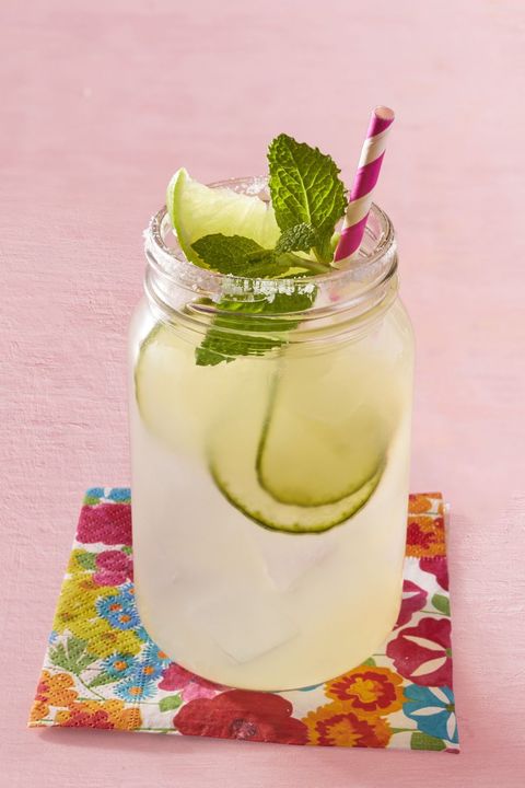 mar ga ree ta in mason jar with mint and cucumber with pink striped straw