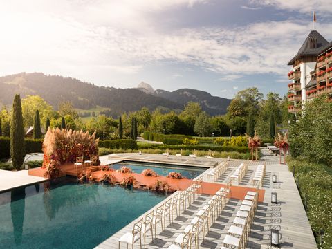 floating wedding ceremony on the pool of the hotel the alpina in gstaad