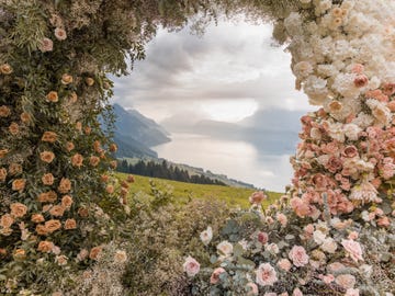 wedding ceremony outdoor and wedding arch at villa honegg lake lucerne