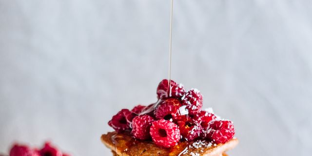 Stack of raspberry and maple syrup pancakes
