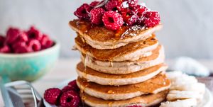 Stack of raspberry and maple syrup pancakes