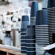 Stack of upside down disposable cups at cafe stack of upside down disposable cups at cafe