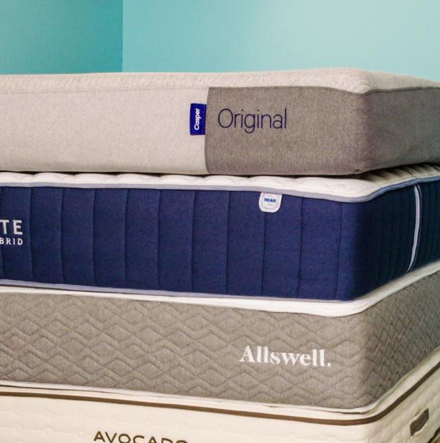 a stack of mattresses from good housekeeping's test for the best mattress