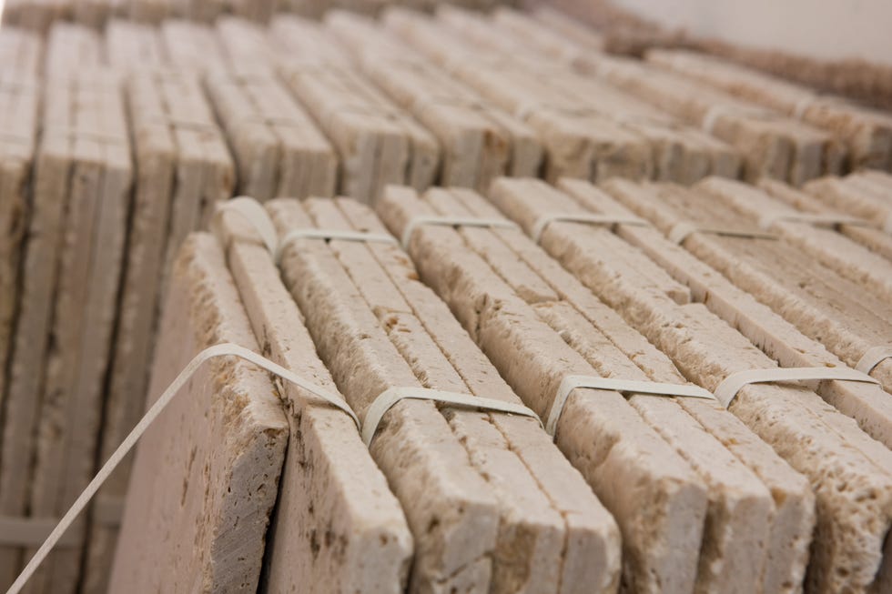 stacks of travertine tile