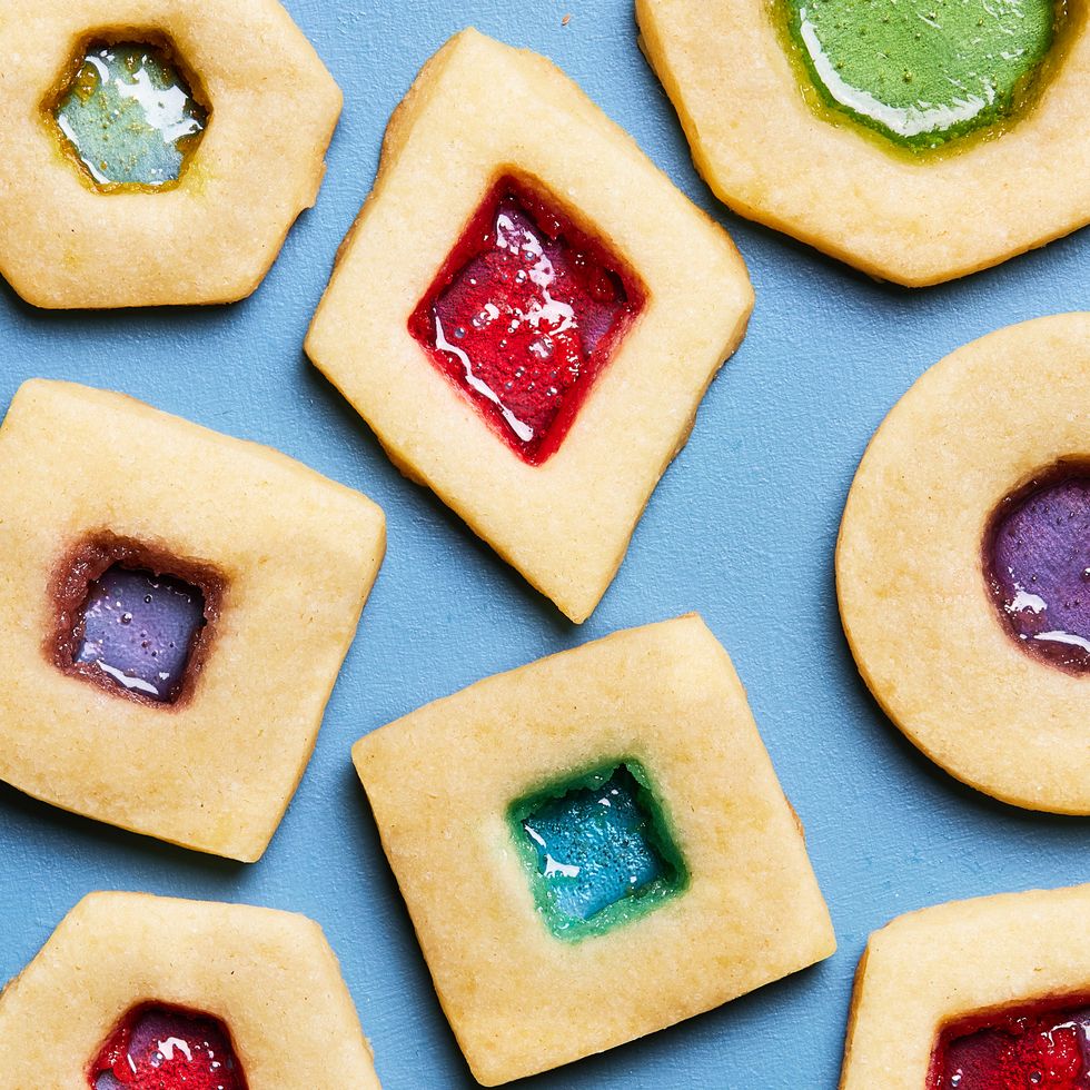 sugar cookies with cutouts filled with melted jolly ranchers to look like stained glass
