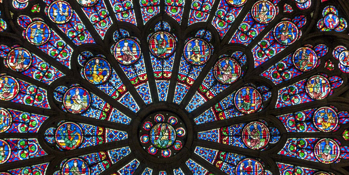https://hips.hearstapps.com/hmg-prod/images/stained-glass-rose-window-in-notre-dame-cathedral-paris-france-1494433394.jpg?crop=1.00xw:0.662xh;0,0.187xh&resize=1200:*