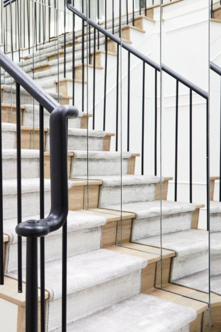 a set of stairs with mirrors