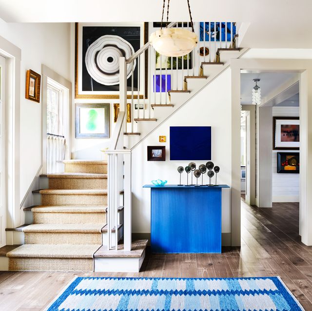 stair case with blue decor