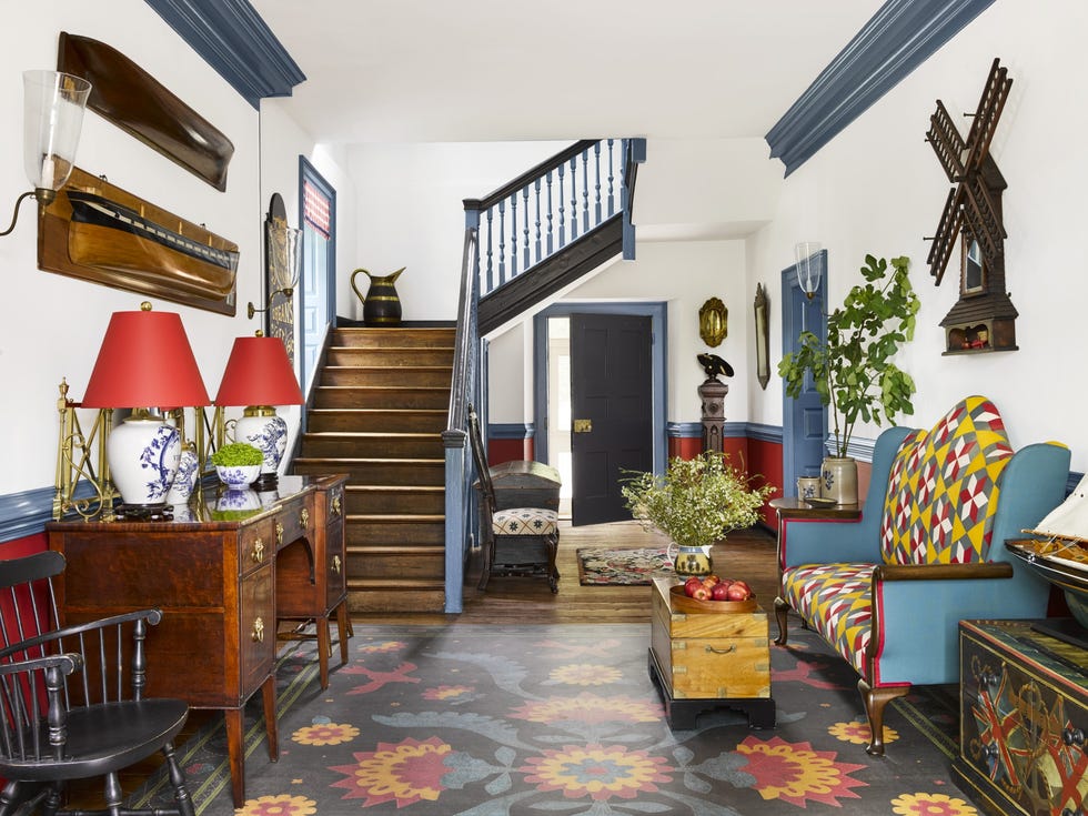 colorful entryway with a quilt patterned painted floors