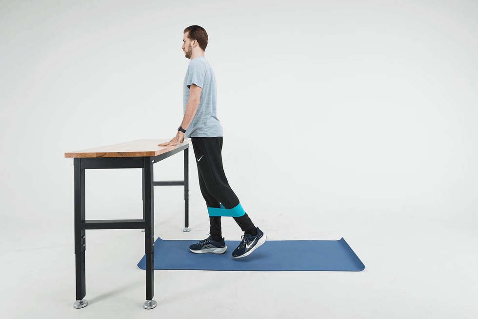 standing backwards lift