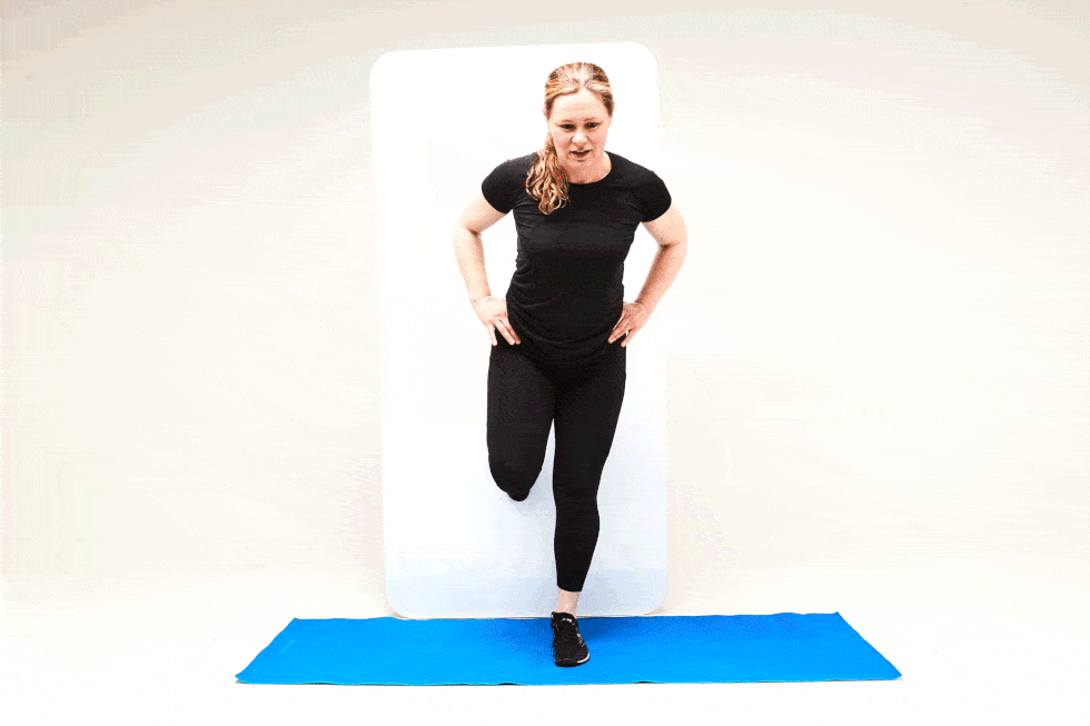 Stretching Workout In Standing Posture With Sport Woman Stock