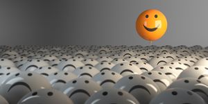 standing out from the crowd with smiling sphere