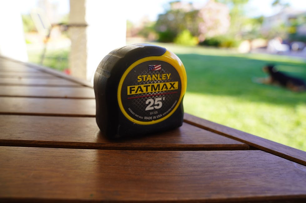 stanley tape measure on a wooden surface