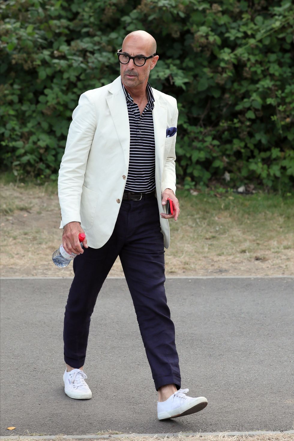 https://hips.hearstapps.com/hmg-prod/images/stanley-tucci-attends-mens-final-day-at-the-wimbledon-2019-news-photo-1590591295.jpg?resize=980:*