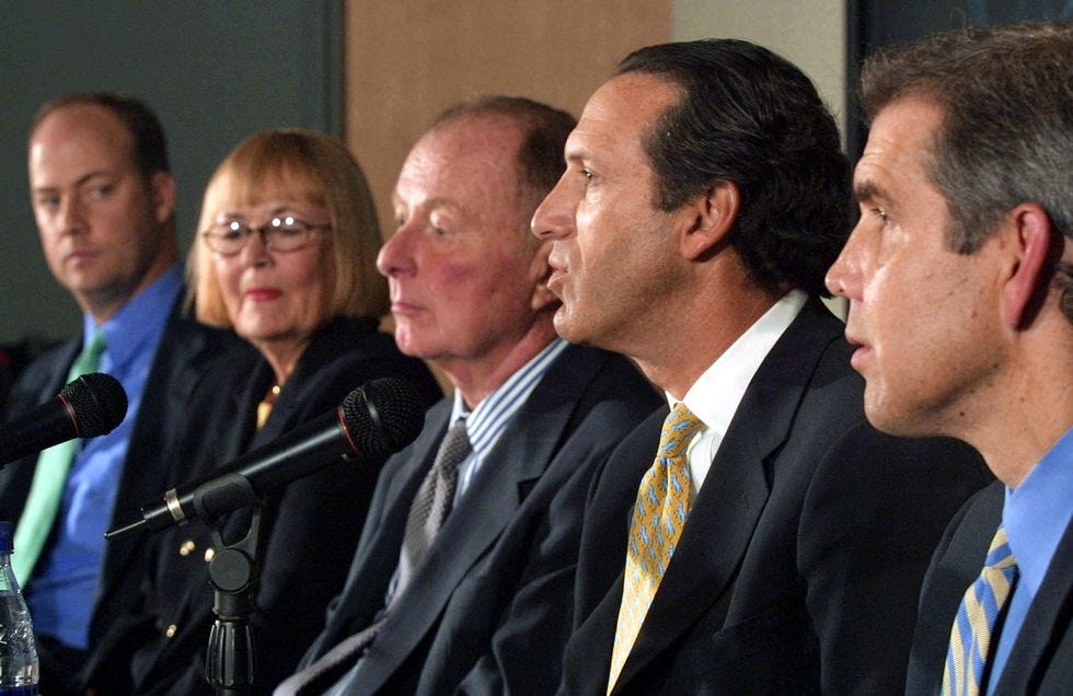 Starbucks Coffee CEO Howard Schultz (2nd R) addres
