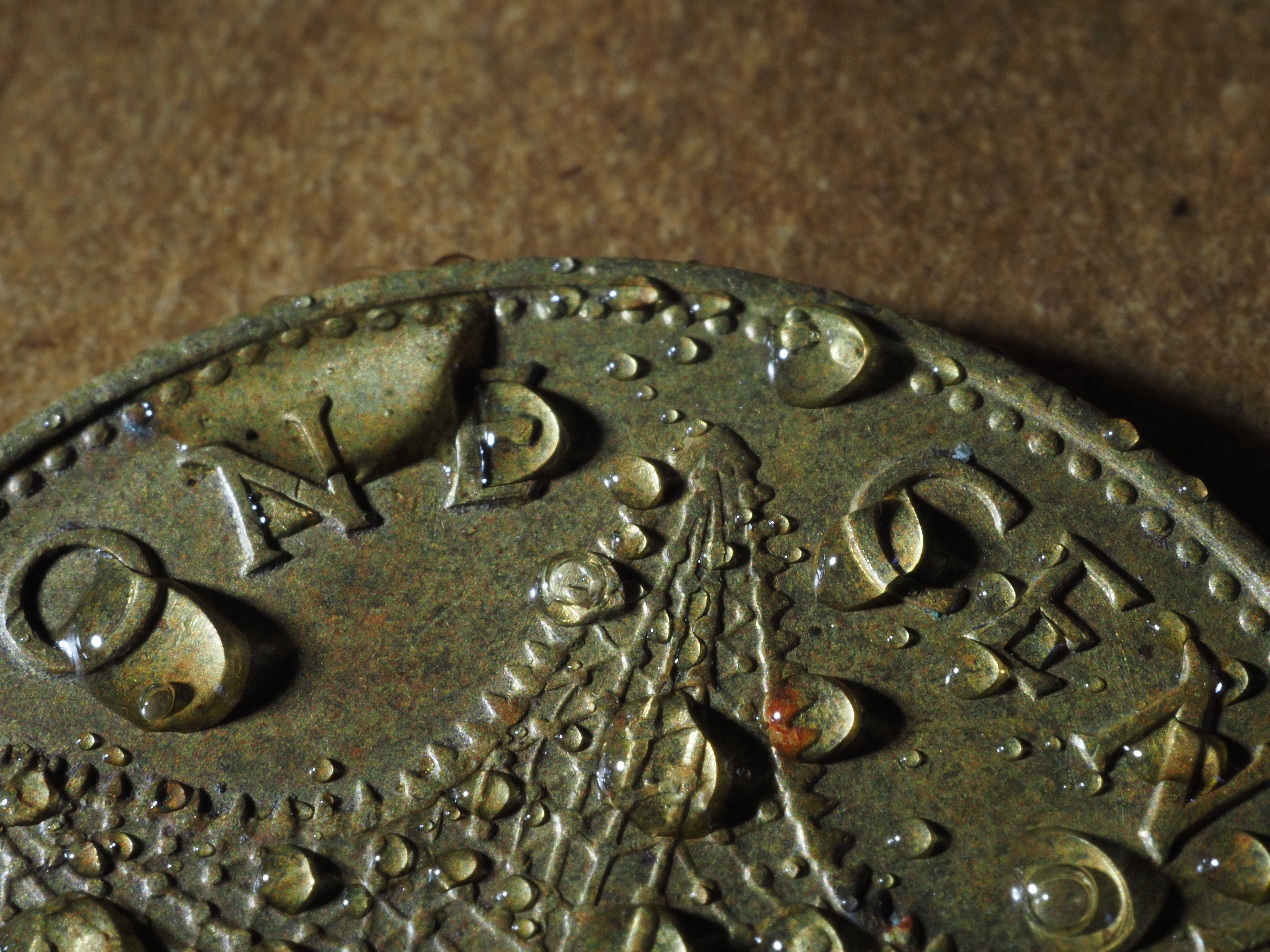 starfish-coin-with-drops-royalty-free-image-1749676051.pjpeg