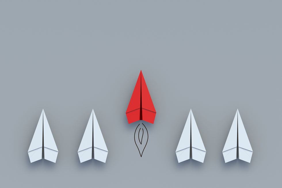 staying ahead of your competitors accelerated development of the company innovation vision customized solution unique skills red paper plane and whites 3d render