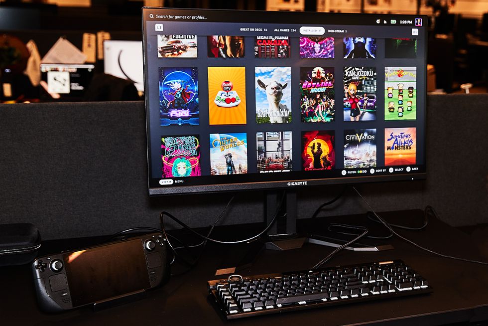 steam deck hooked up to a computer displaying its game library