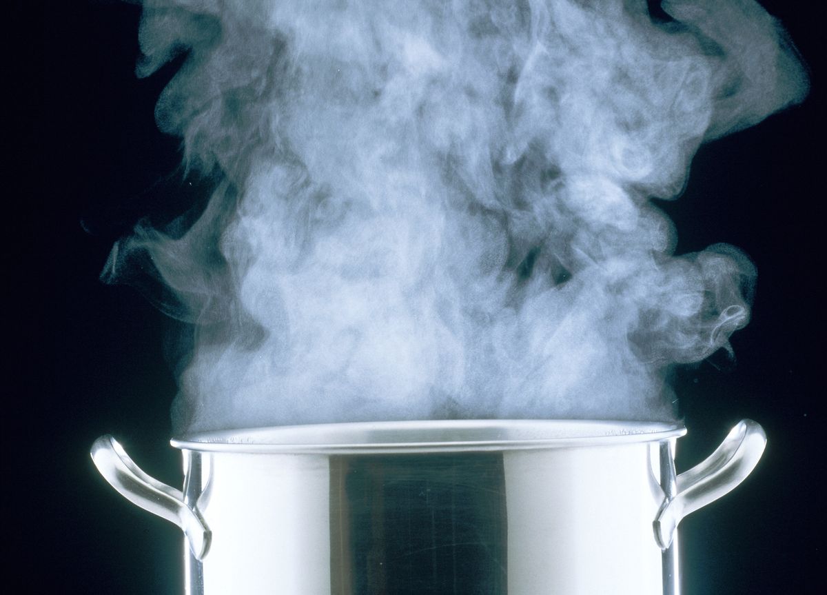 steam rising from cooking pot