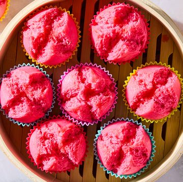 blooming pink cupcakes topped with maraschino cherries