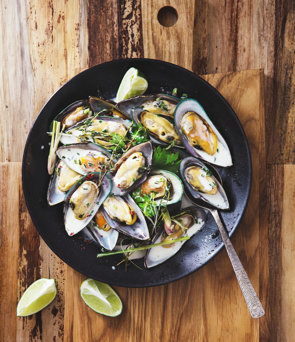 steamed mussels with herbs in coconut sauce