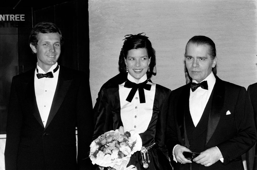 princess caroline of monaco c, flanked by her husband stefano casiraghi, and german fashion designer karl lagerfeld l pose on march 16, 1985 during the annual rose ball at the monte carlo sporting club in monaco     afp photo ralph gatti photo by ralph gatti  afp        photo credit should read ralph gattiafp via getty images