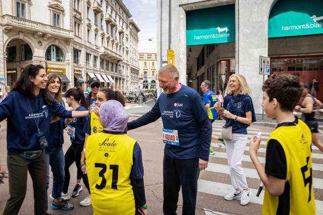 participants and volunteers engaging in an event in an urban setting