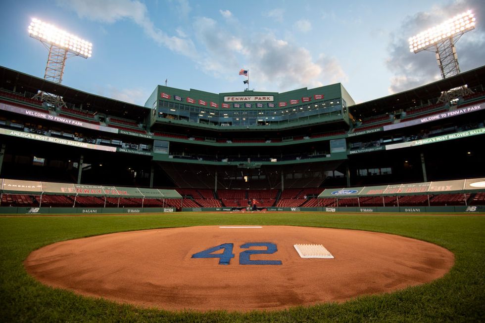 a blue number 42 sits painted into the pitchers mound at fenway park