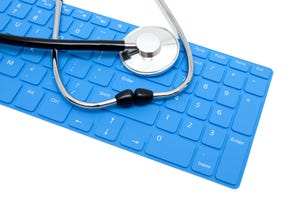 stethoscope and keyboard stethoscope isolated on white background